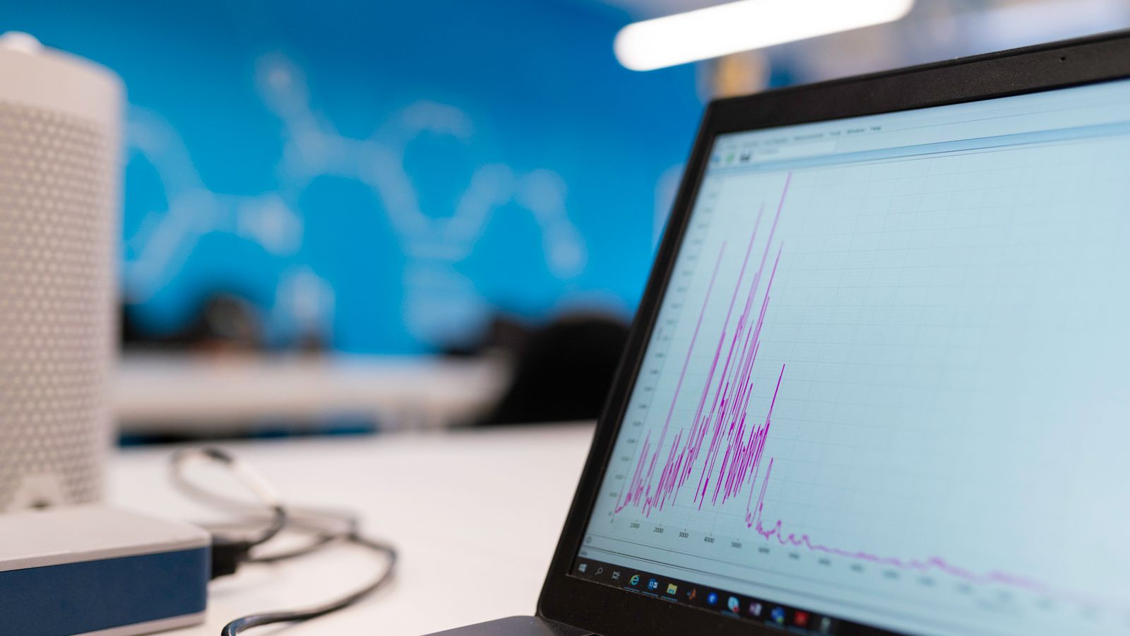 Laptop screen showing a data graph representing social media metrics to track