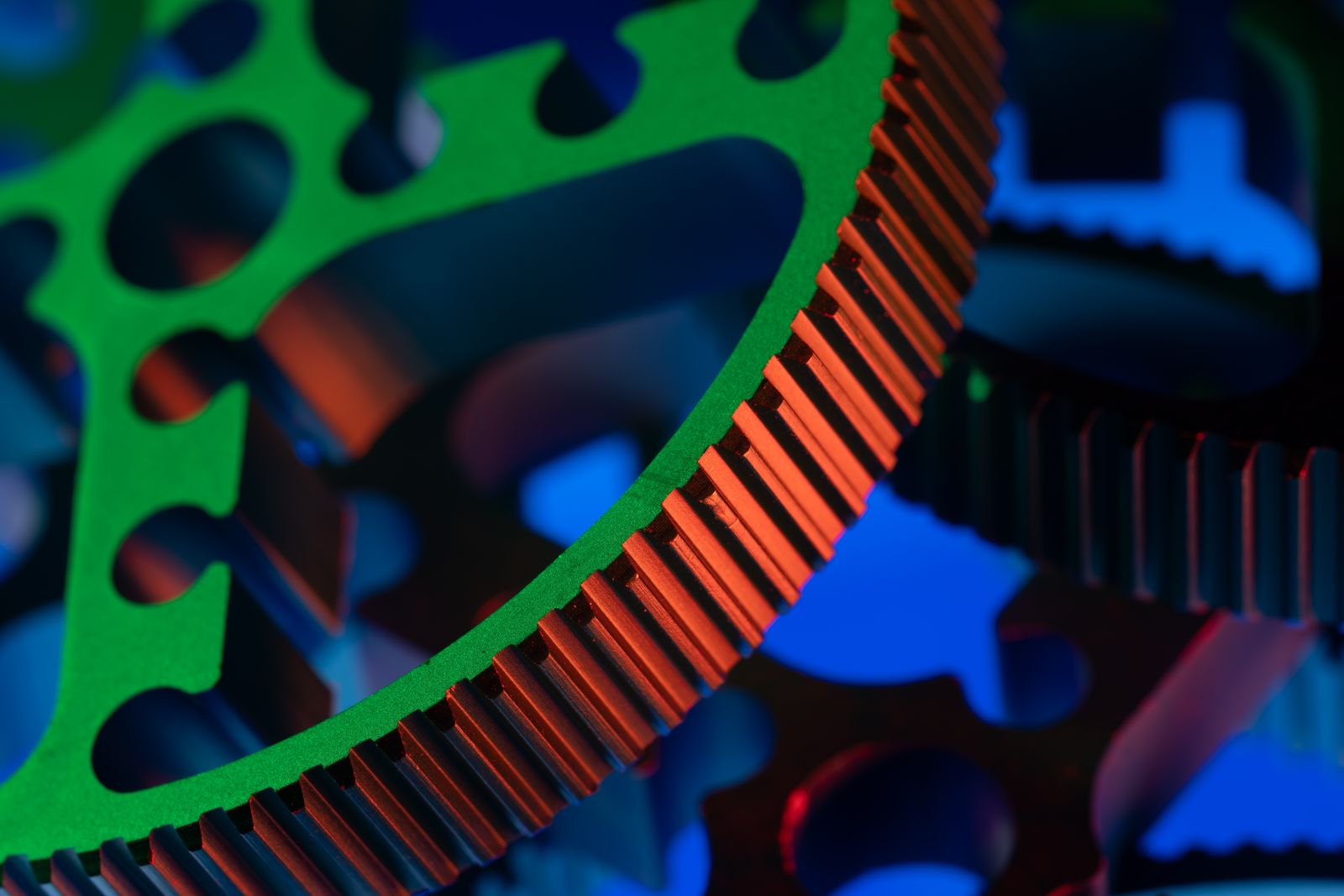 Close-up of colorful interlocking gears representing marketing automation working together